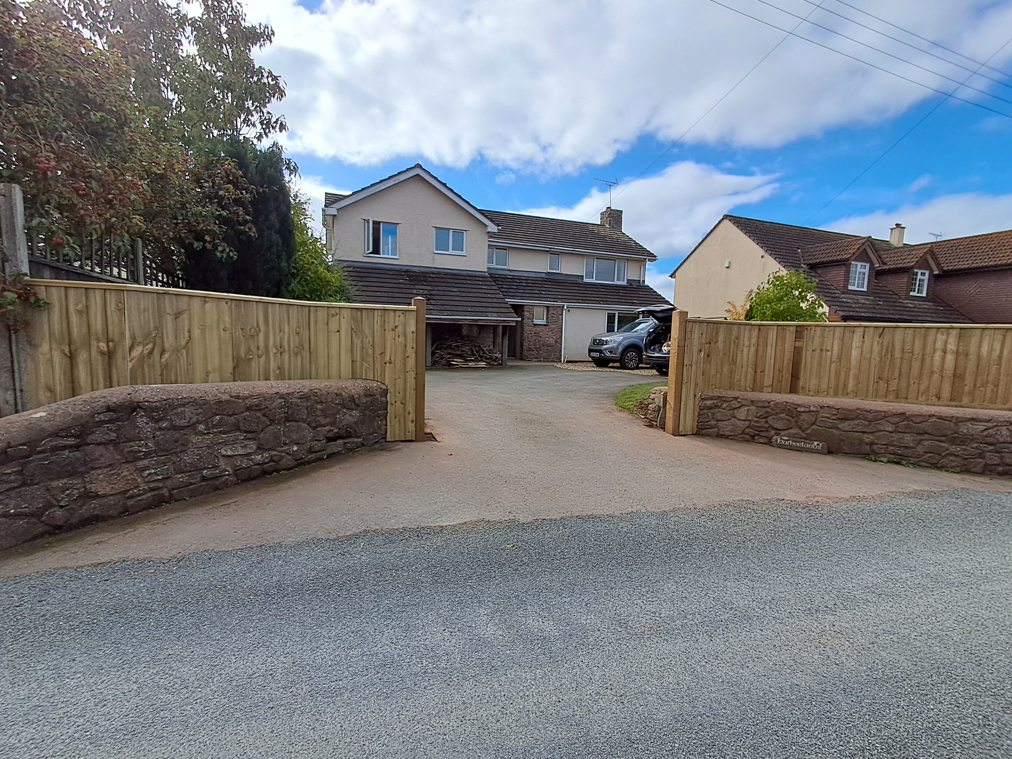 Driveway entrance with fencing